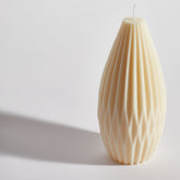 Textured detail of Boujie tall lantern decorative candle, hand-crafted wax finish